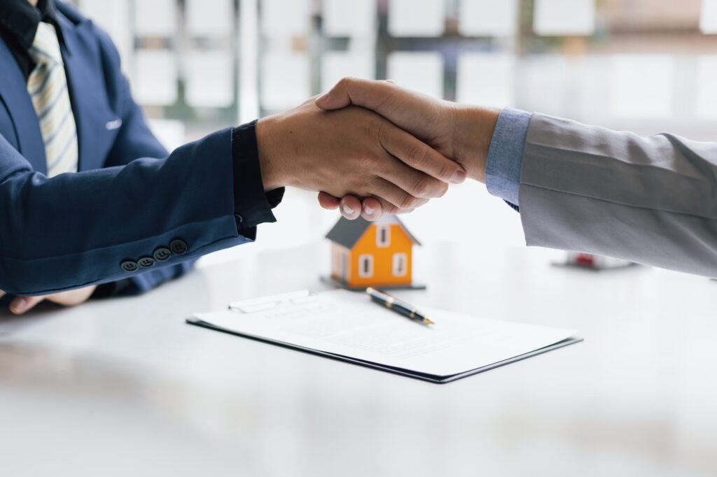 Businessman handshake after reaching a real estate deal.